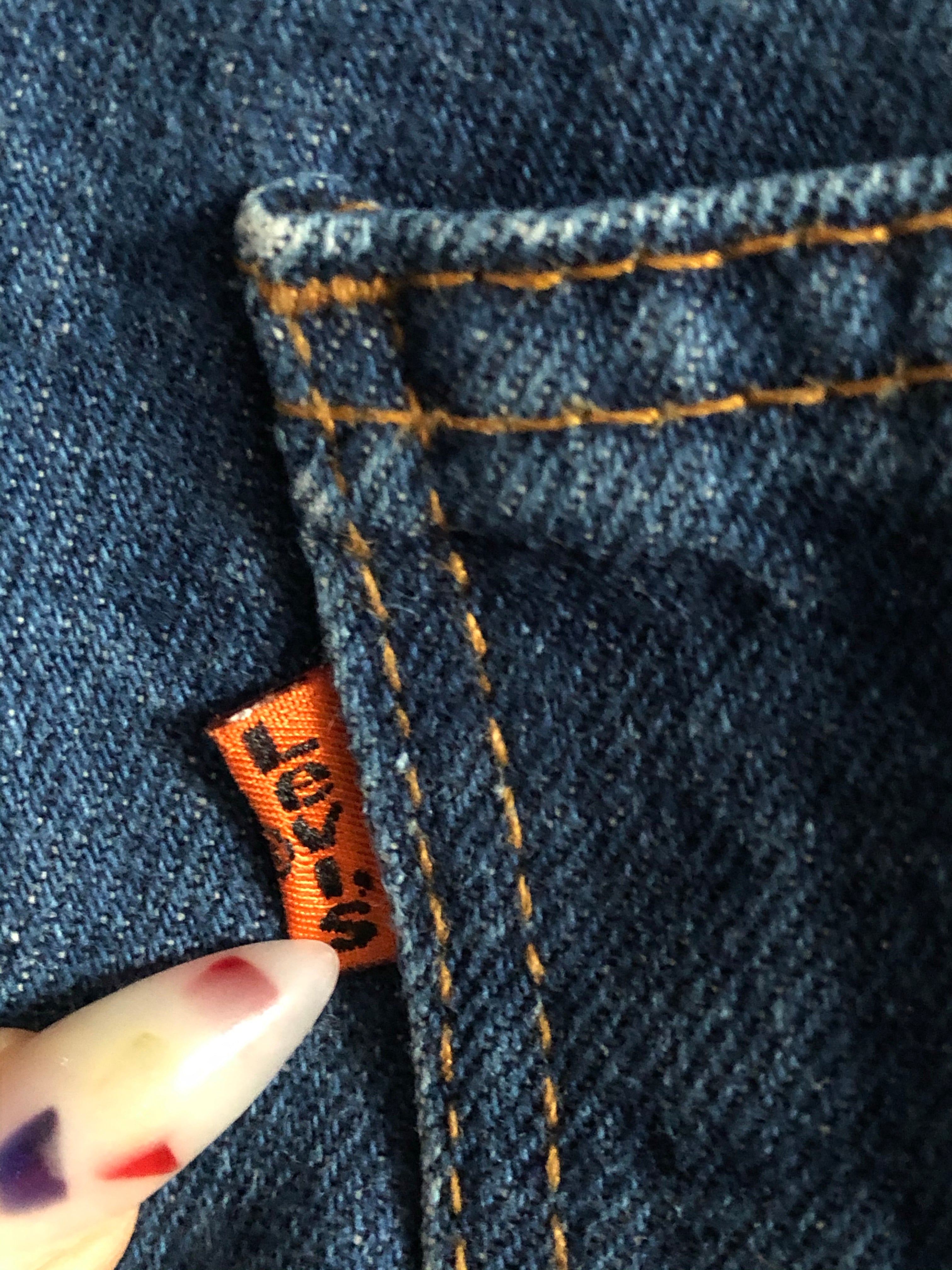 Orange hotsell tag levi's